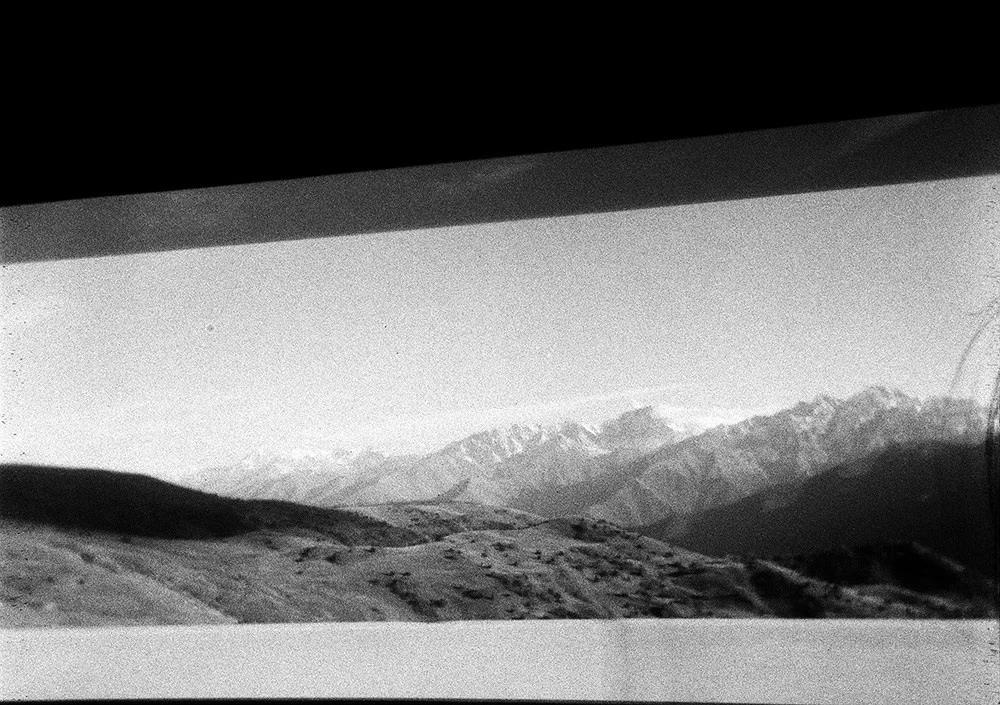 Black-and-white film — coarse grain and the cold of morning mountains